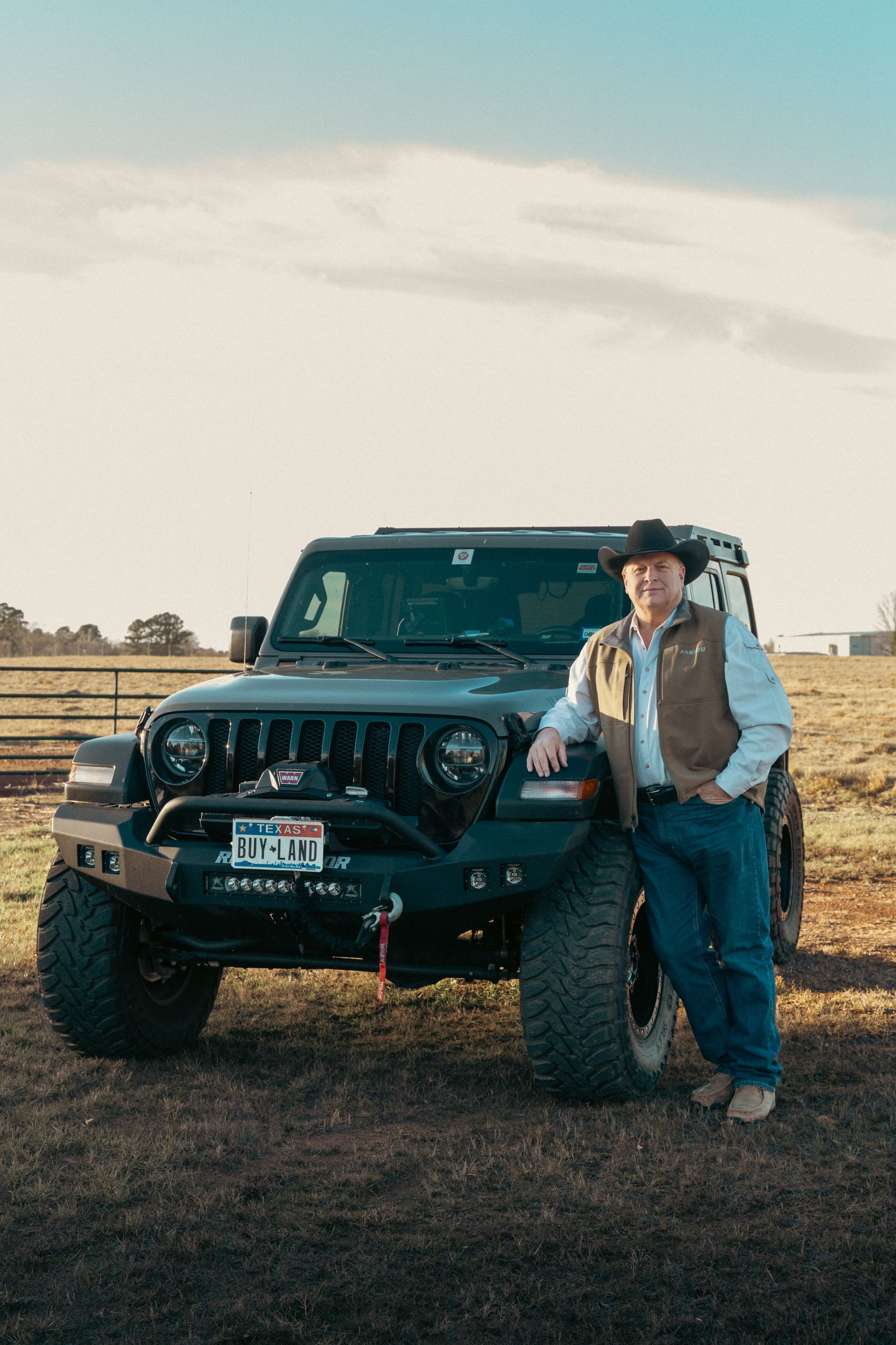 Tilmon Media high end photography of man with a jeep and airplane hanger